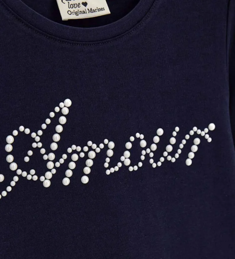 T-shirt blu con perle